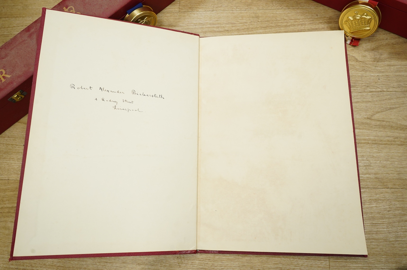 Two EIIR cased grant of arms to Peter Bickersteth and Peter Bickerstaff-Earnshaw together with a book on the pedigree of Bickersteth inscribed to Robert Alexander Bickersteth, 4 Rodney Street Liverpool